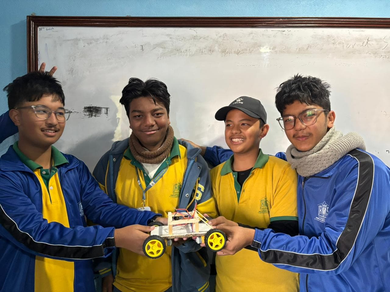 IHR students working on robotics projects in the RMS School